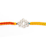 
  Buy Divine Lotus Rakhi | Pure 925 Silver for a Bond That Lasts forever Online In India at Oprata
